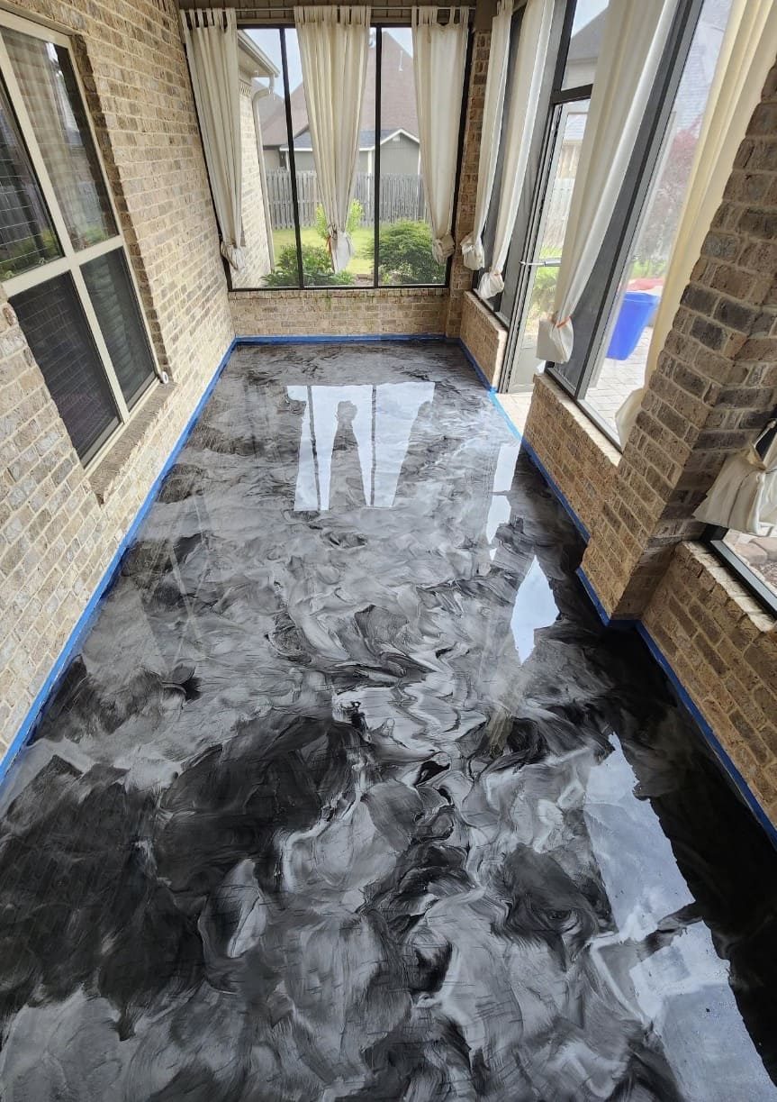 Black and white metallic epoxy sunroom floor by Titan Floor Systems